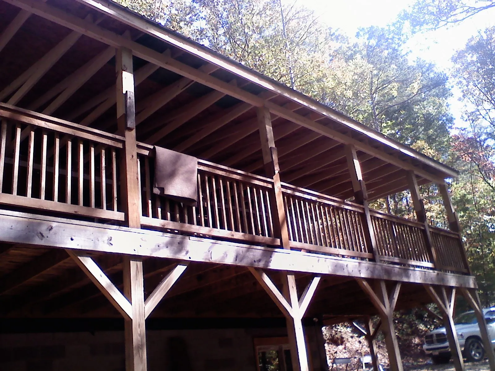 Timber framing under a new elevated porch and deck — Roof Leak Repair in Moline by Roofing Brothers